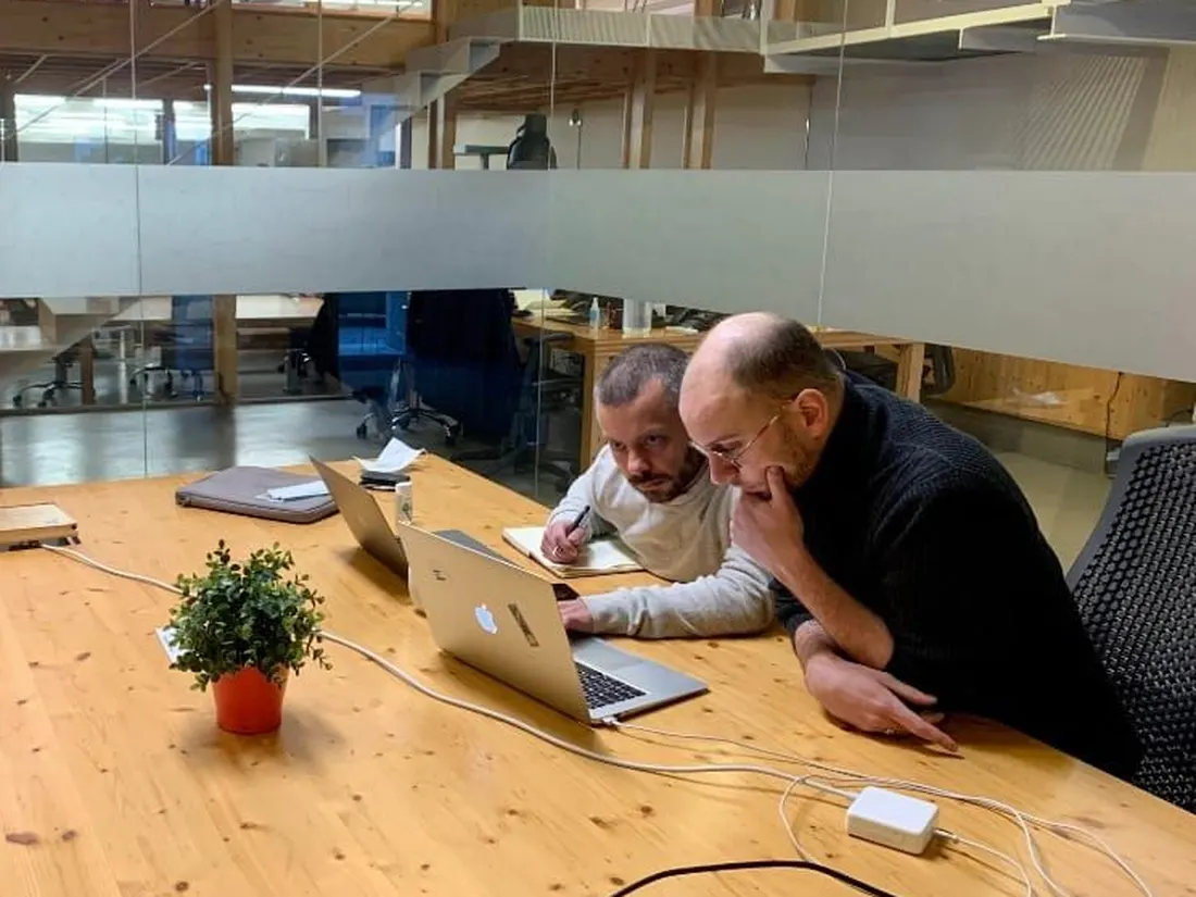 Two EdgeAngel consultants at work in the offices